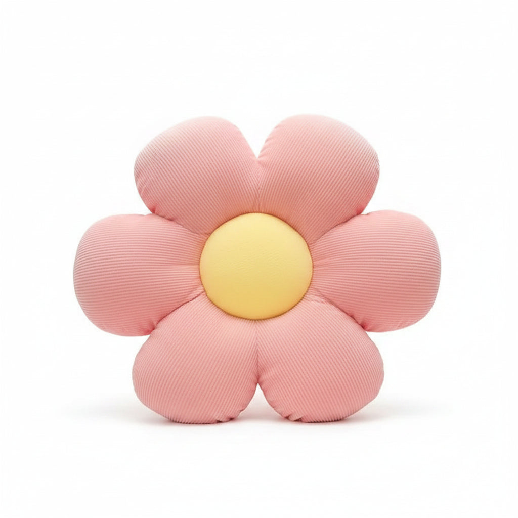 Coussin fleur en peluche rose à cœur jaune, sur fond blanc