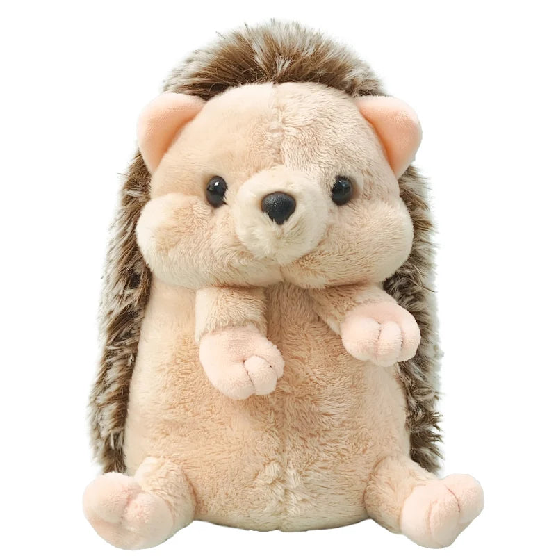 Peluche hérisson crème aux piquants bruns, assise sur fond blanc