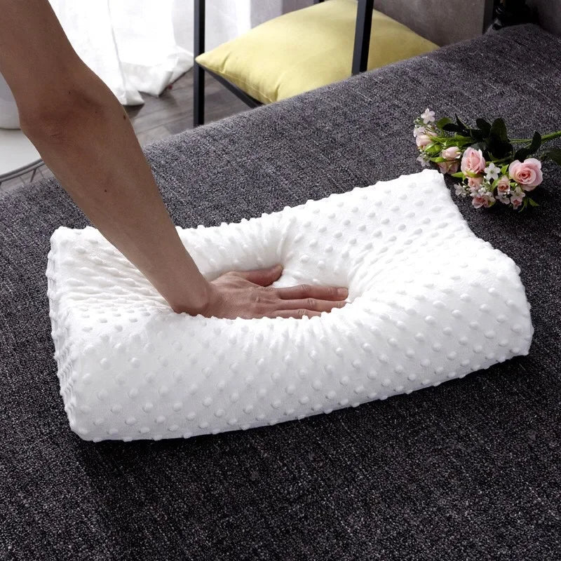 Orthopedic memory foam pillow, adjustable on the side.